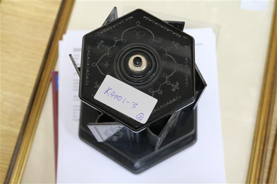 A bakelite musical cigarette dispenser and a similar pottery kennel